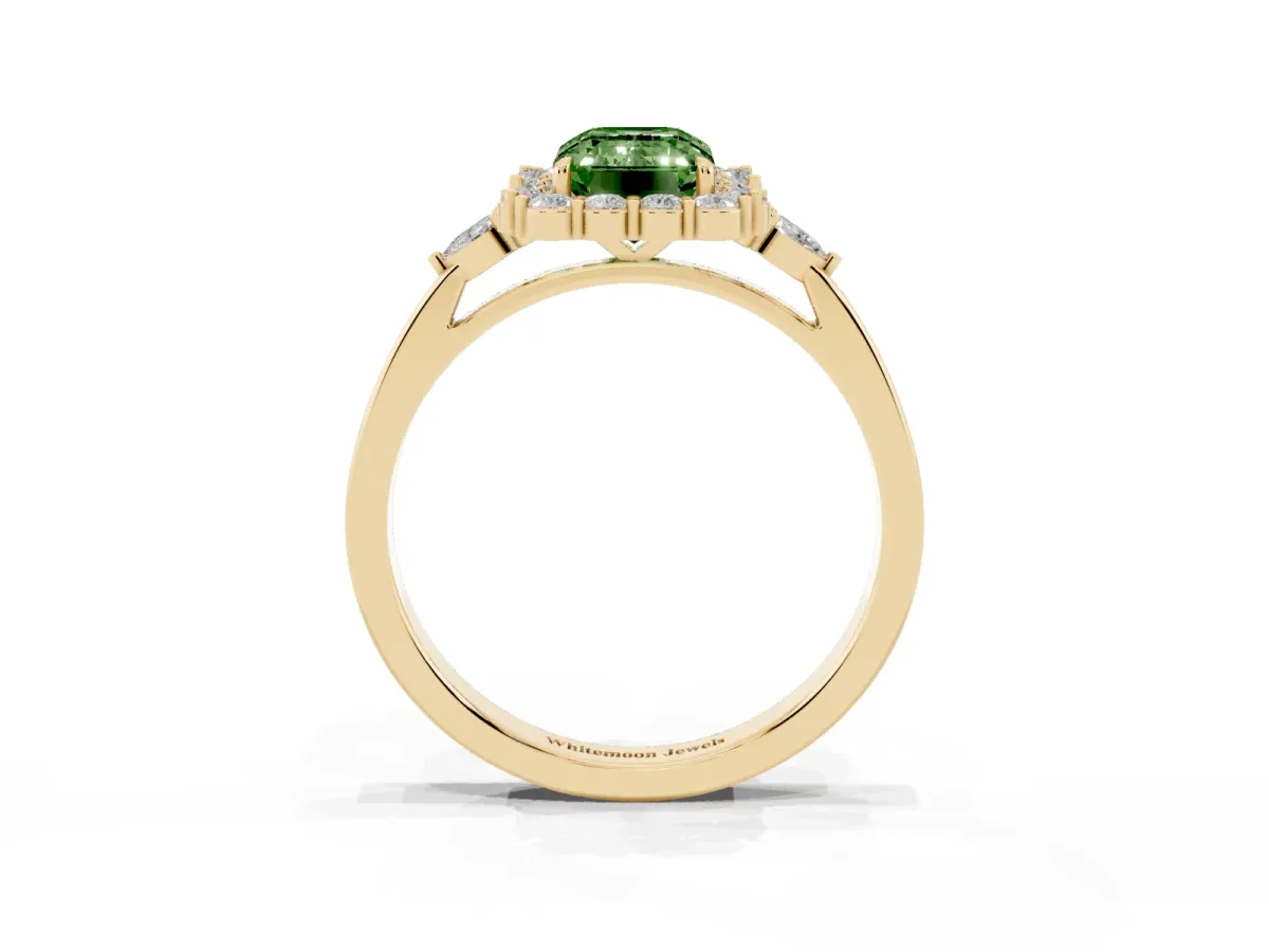Fancy Green Emerald Cut Diamond Halo Ring with Pear Side Stones and Prong Setting Yellow gold