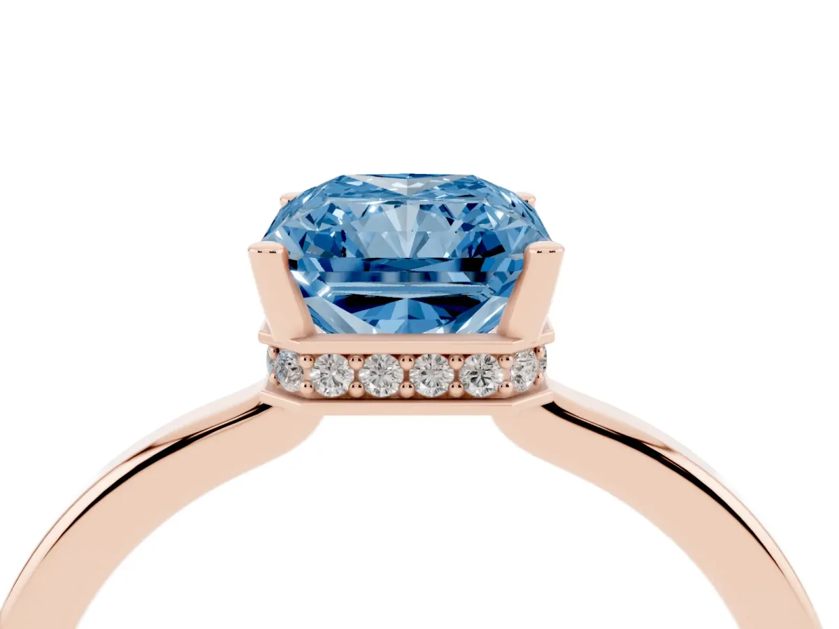 Fancy Blue Radiant Cut Cut Solitaire Engagement Ring with Four-Prong Setting on a Classic Band Rose gold
