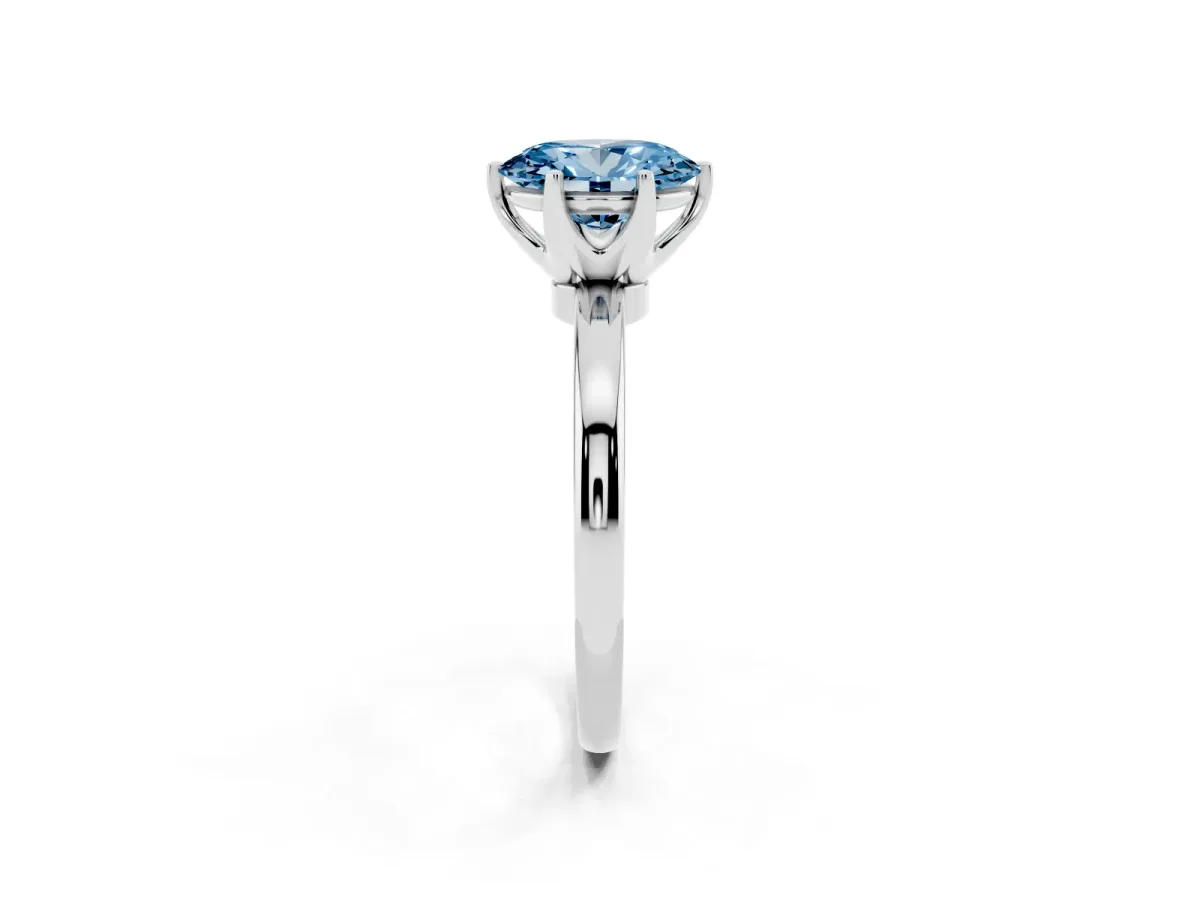 Fancy Blue Oval Cut Solitaire Diamond Ring with Six-Prong Setting on a Classic Band Silver