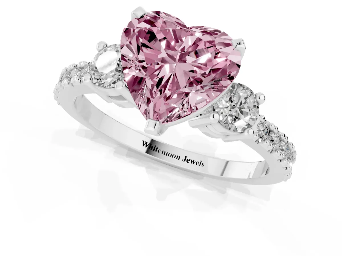 Fancy Pink Heart Cut Three-Stone Diamond Pavé Band with Prong Setting Platinum