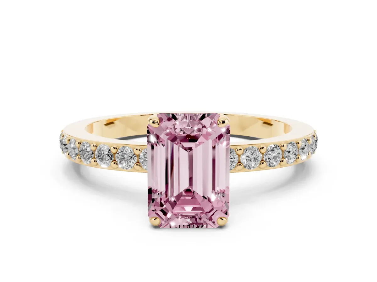Fancy Pink Emerald Cut Diamond Pavé Engagement Ring with Round Accents and Prong Setting Yellow gold