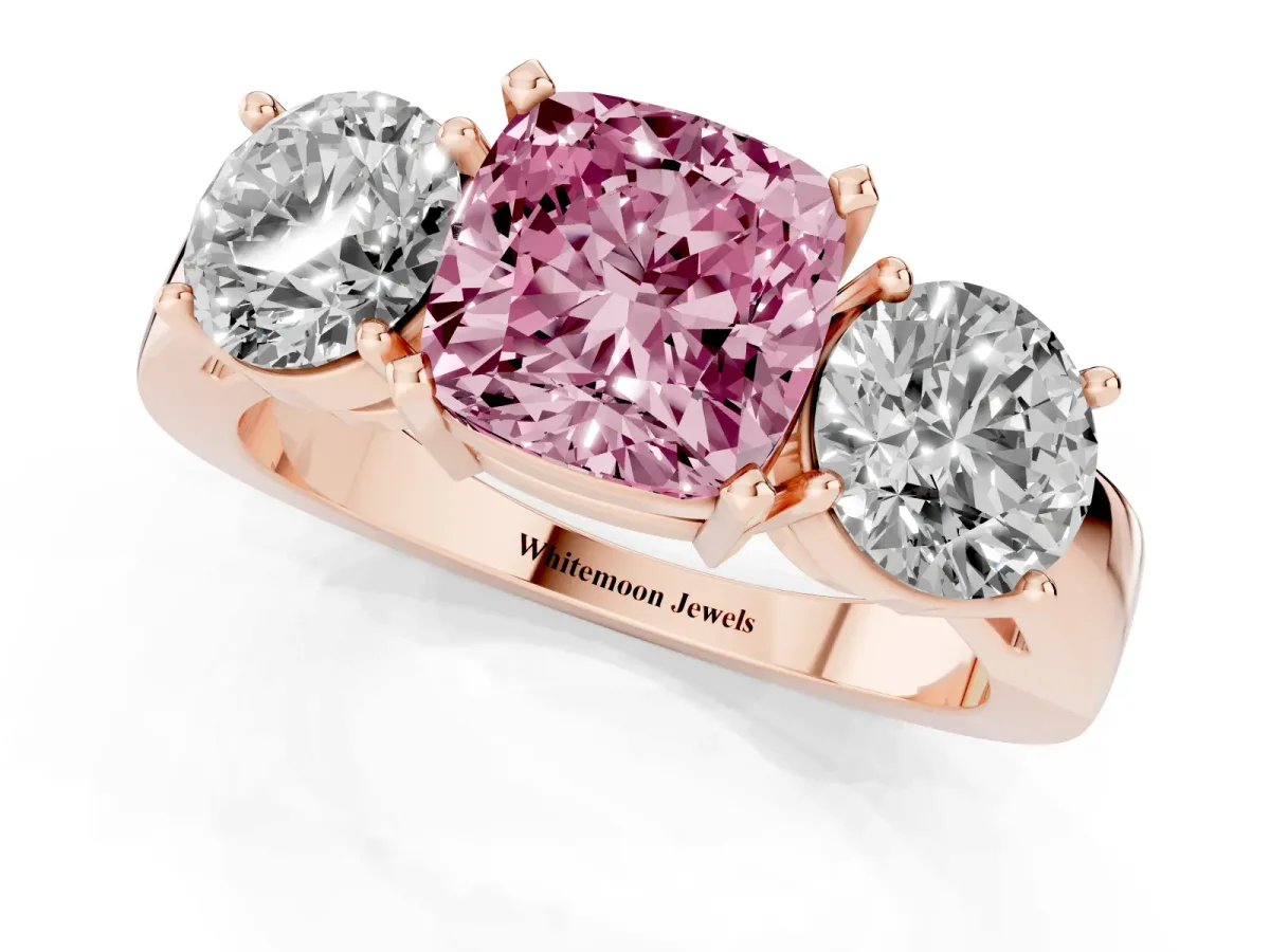 Fancy Pink Three-Stone Cushion Cut Diamond Ring with Round Side Stones, Classic Band, and Four-Prong Setting Rose gold