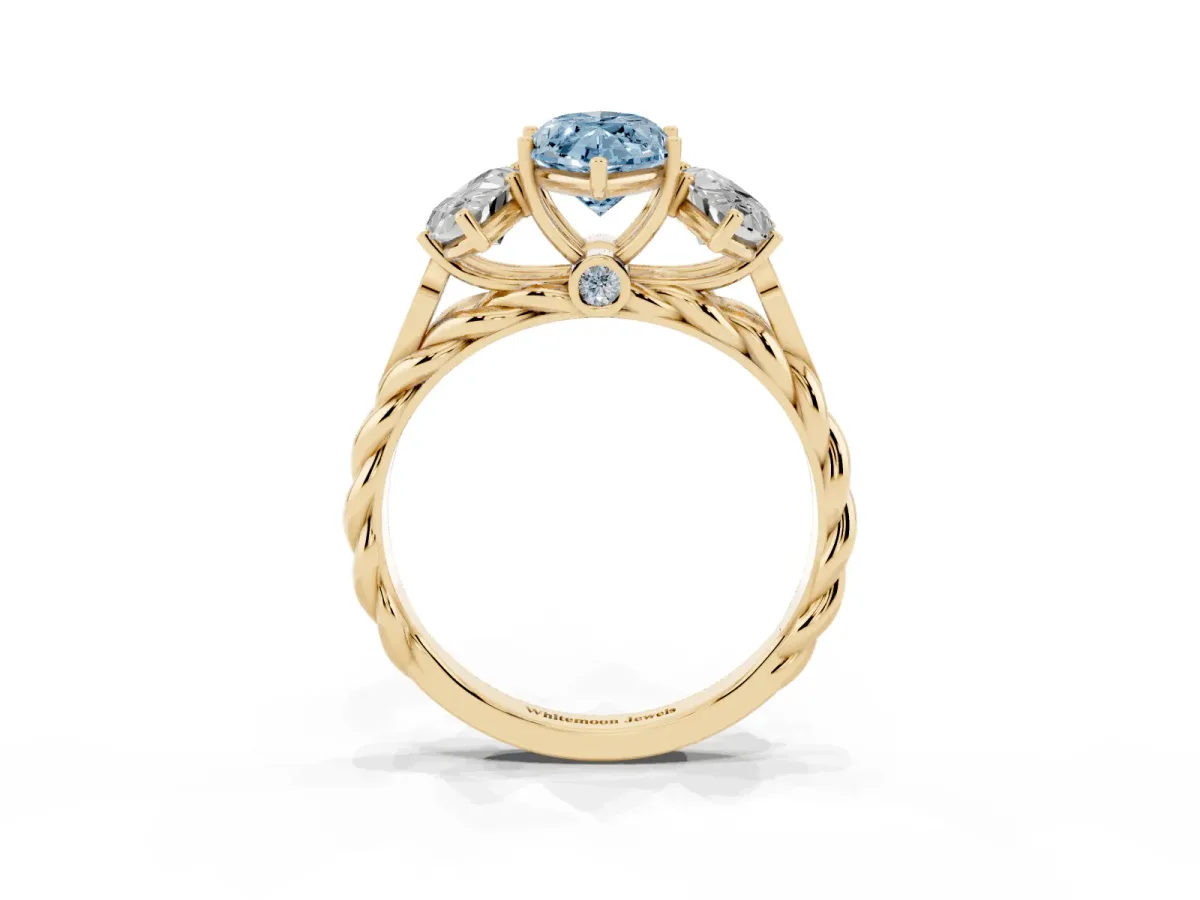 Fancy Blue Three-Stone Marquise Cut Diamond Braided Band Ring with Four-Prong Setting Yellow gold