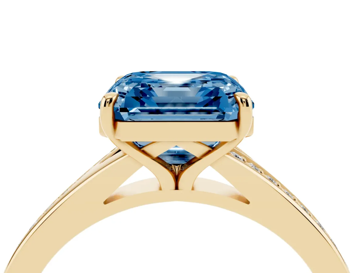 Fancy Blue Asscher Cut Diamond Solitaire Ring with Pavé Band and Prong Setting Yellow gold