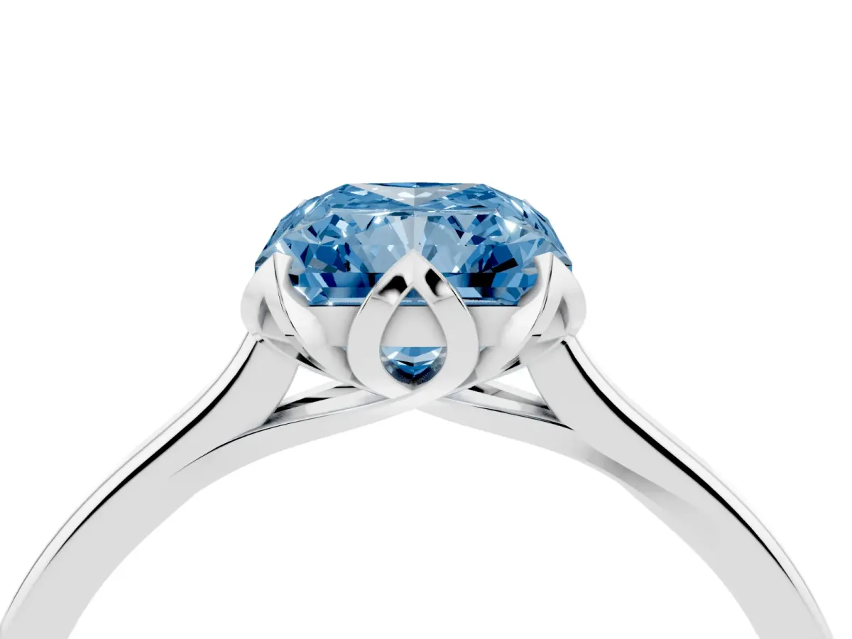 Fancy Blue Radiant Cut Diamond Solitaire Ring with Flower Prong Setting and Classic Band Silver