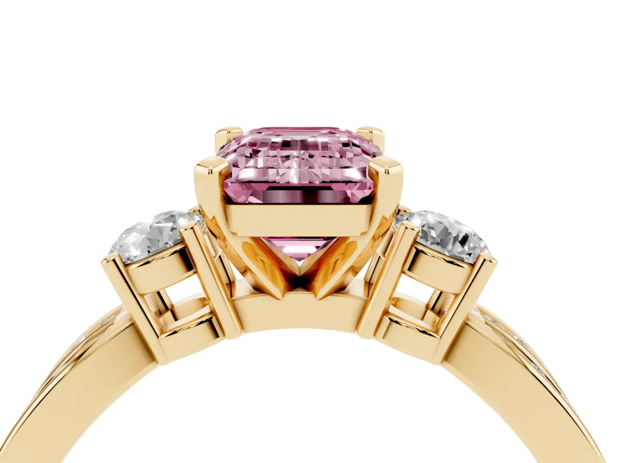 Fancy Pink Three-Stone Emerald Cut Cut Diamond Twist Band with Prong Setting Yellow gold