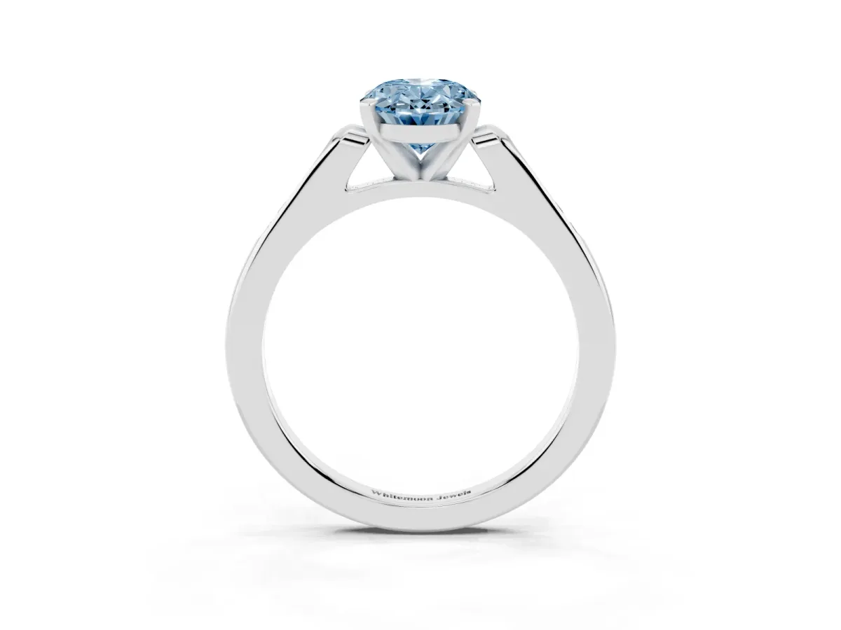 Fancy Blue Oval Cut Diamond Solitaire Ring with Channel Set Round Band and Prong Setting Silver