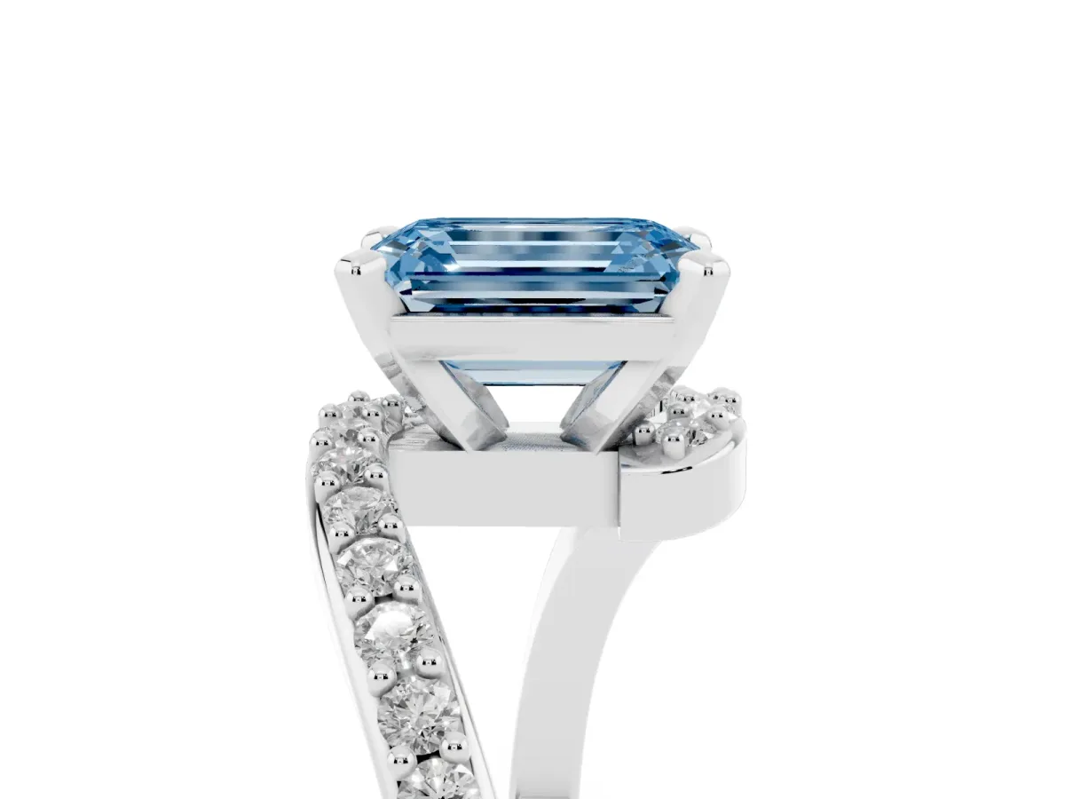 Fancy Blue Emerald Cut Solitaire Twist Band with Pave Set Diamonds and Four-Prong Setting Platinum