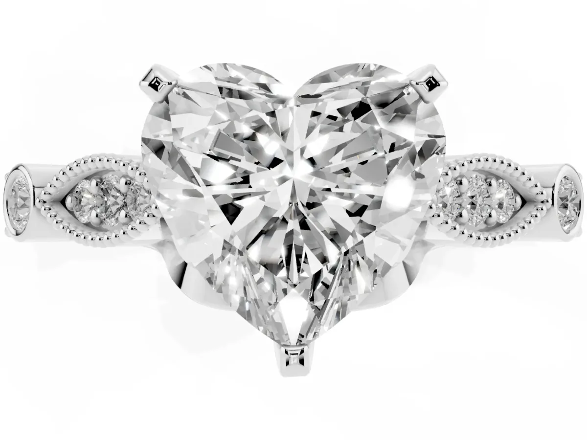 Heart Cut Cut Diamond with Milgrain Marquise and Bezel Accents on a Solitaire Band with Prong Setting Platinum