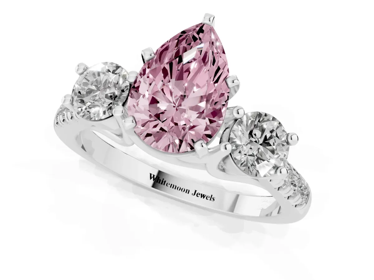 Fancy Pink Three-Stone Pear Cut Diamond Pavé Band with Four-Prong Setting Platinum