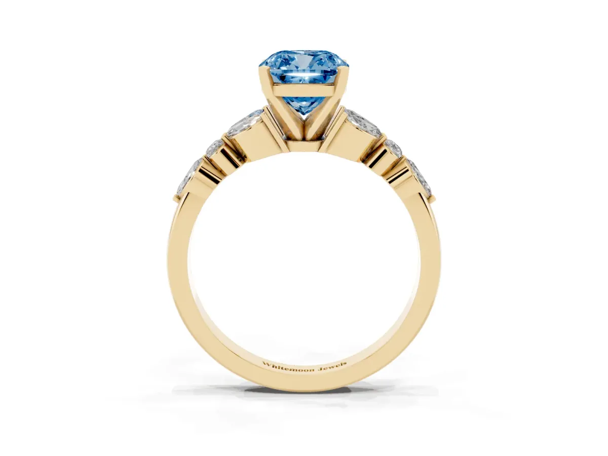Fancy Blue Cushion Cut Diamond Solitaire Ring with Side Stones and Four-Prong Setting Yellow gold