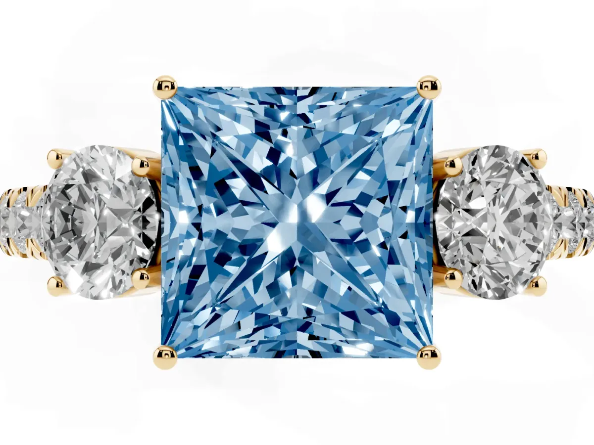 Fancy Blue Princess Cut Cut Diamond Three-Stone Ring with Round Side Stones and Pavé Band Yellow gold