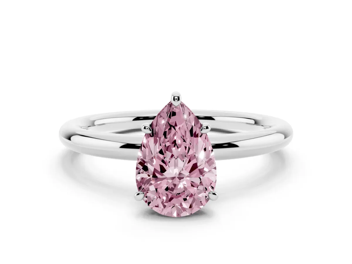 Fancy Pink Pear Cut Solitaire Diamond Ring with Four-Prong Setting on a Plain Band Platinum