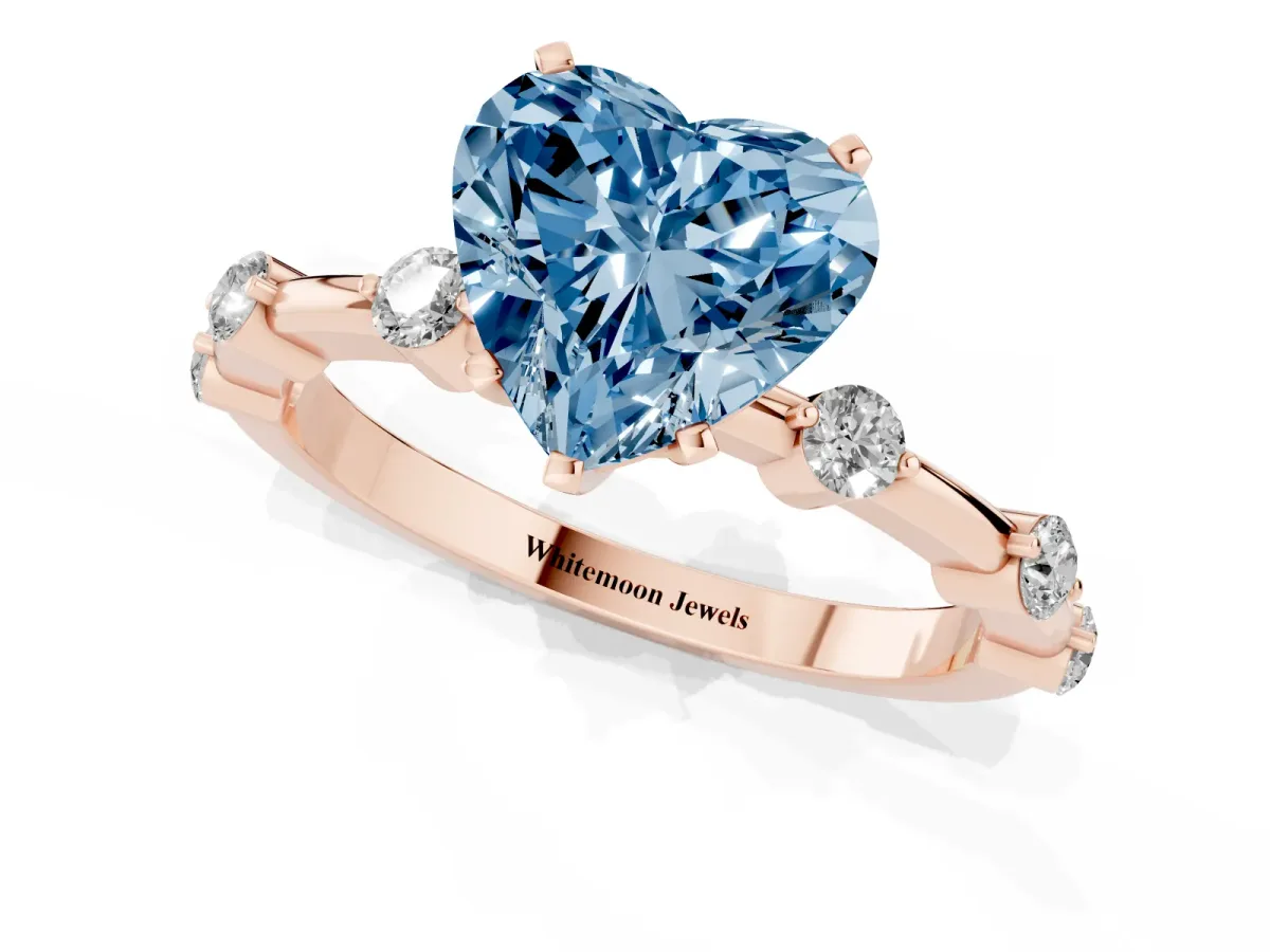 Fancy Blue Heart Cut Solitaire Diamond Ring with Bezel Set Side Stones and Prong Setting Rose gold
