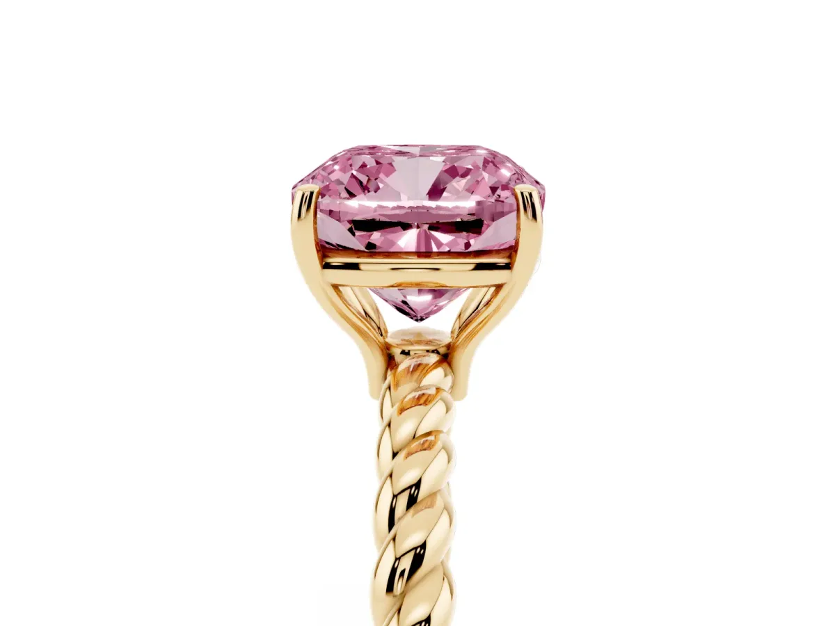 Fancy Pink Cushion Cut Solitaire Twist Band Ring with Four-Prong Setting Yellow gold