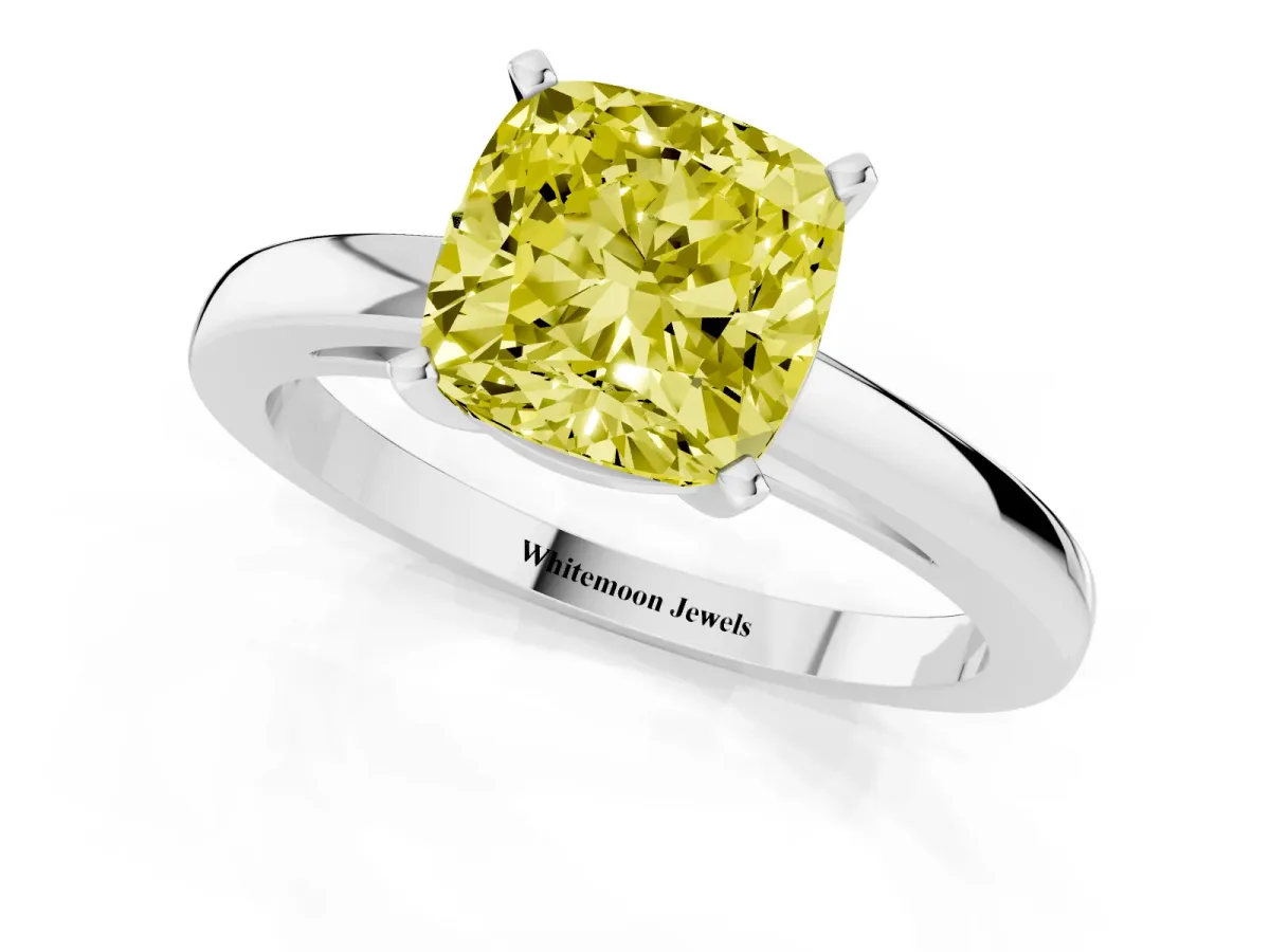 Fancy Yellow Cushion Cut Solitaire Diamond Engagement Ring with Four-Prong Setting on a Classic Band Silver