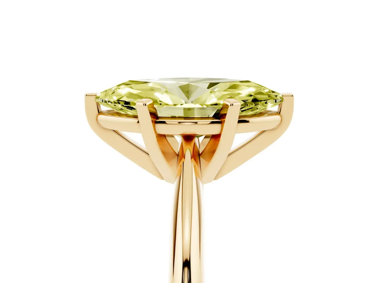 Fancy Yellow Marquise Cut Cut Solitaire Ring with Four-Prong Setting on a Classic Band Yellow gold