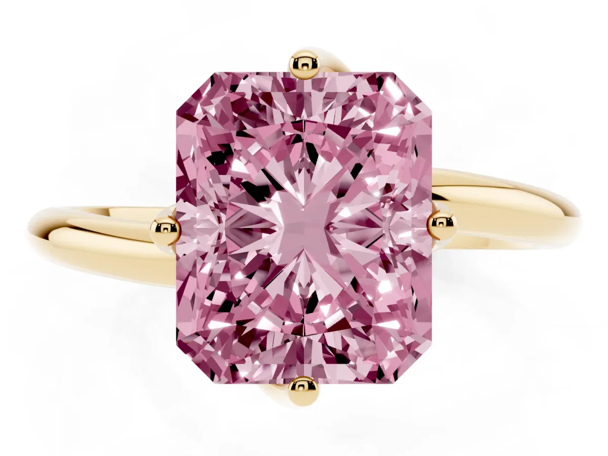 Fancy Pink Radiant Cut Diamond Solitaire Engagement Ring with Four-Prong Setting and Classic Band Yellow gold