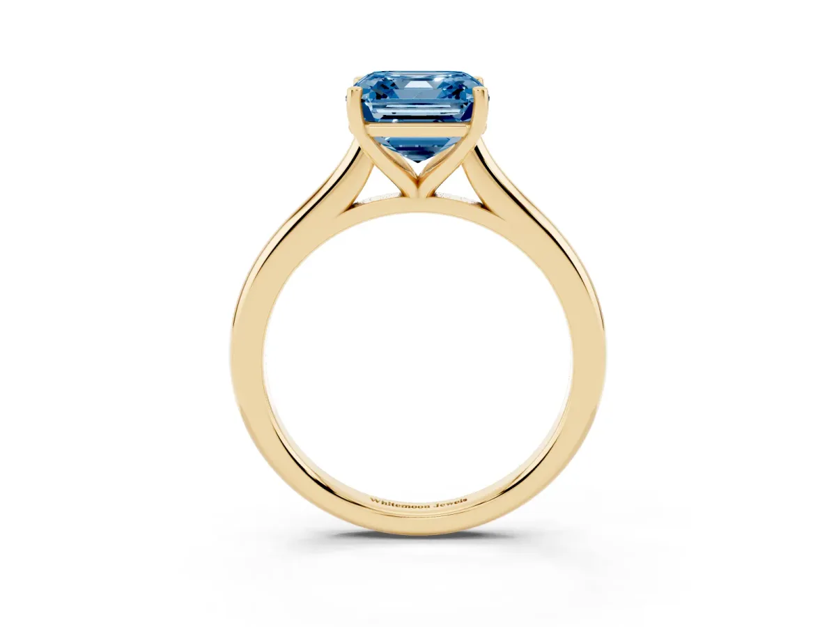 Fancy Blue Asscher Cut Cut Solitaire Ring with Cathedral Band and Four-Prong Setting Yellow gold