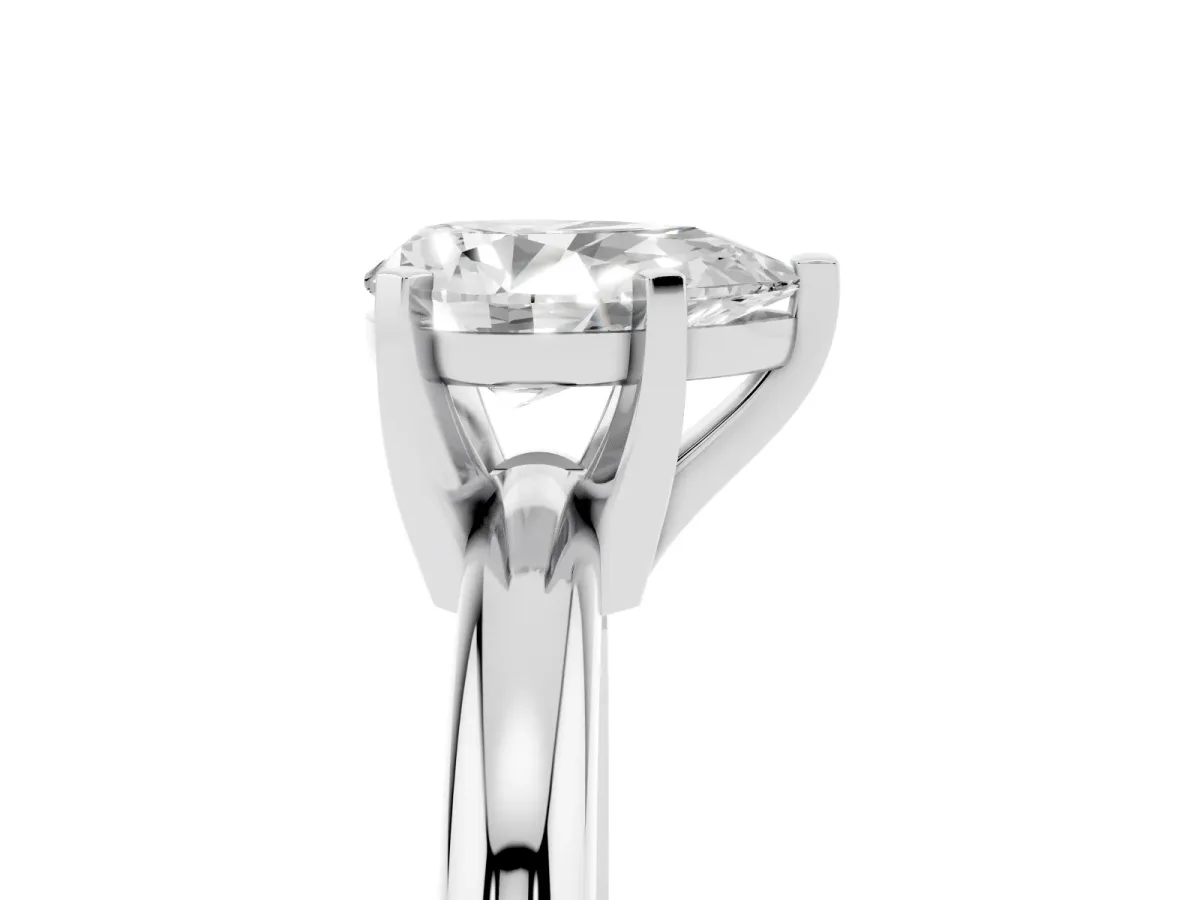 Pear Cut Diamond Solitaire Engagement Ring with Round Band and Four-Prong Setting White gold