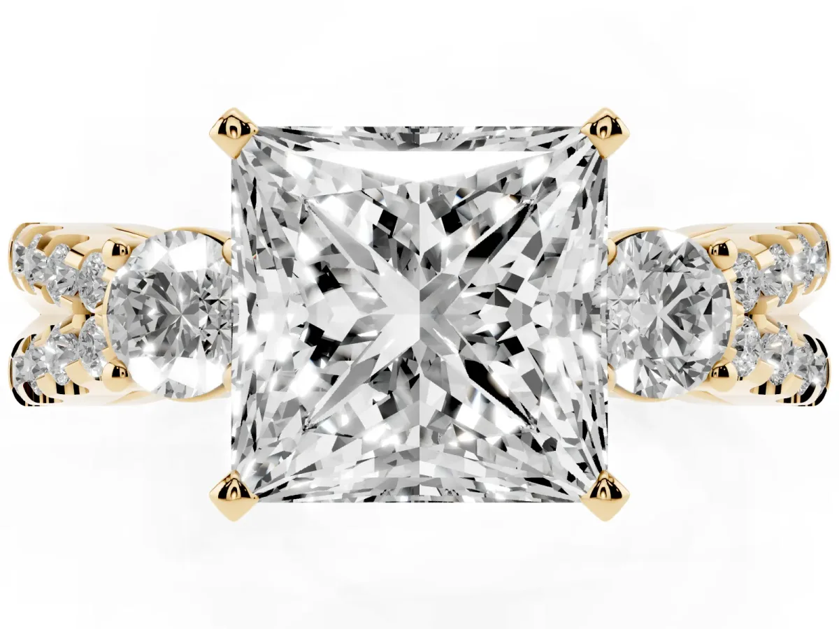 Princess Cut Diamond Three-Stone Ring with Pavé Split Shank and Four-Prong Setting Yellow gold