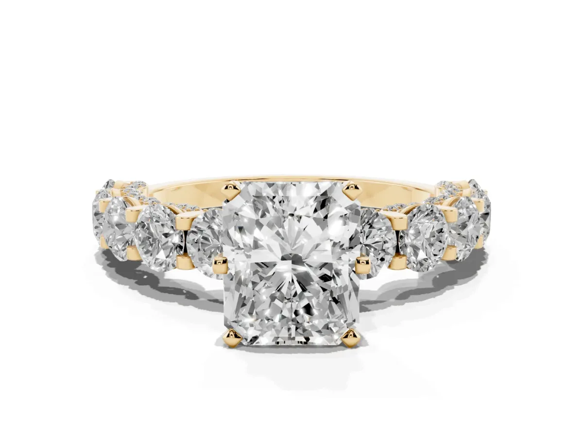 Radiant Cut Diamond Side Stone Engagement Ring with Four-Prong Setting Yellow gold