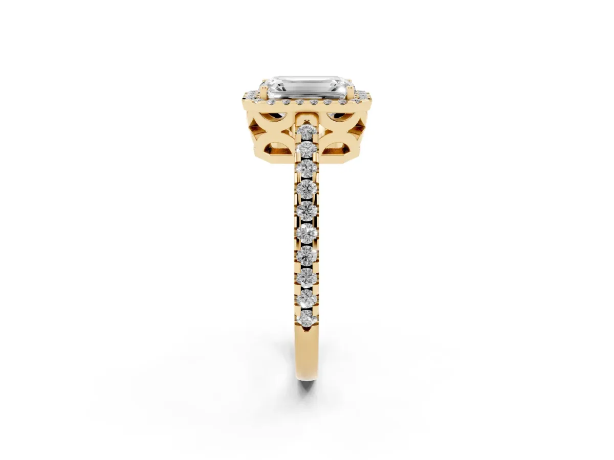 Emerald Cut Diamond Halo Engagement Ring with Pavé Band and Prong Setting Yellow gold