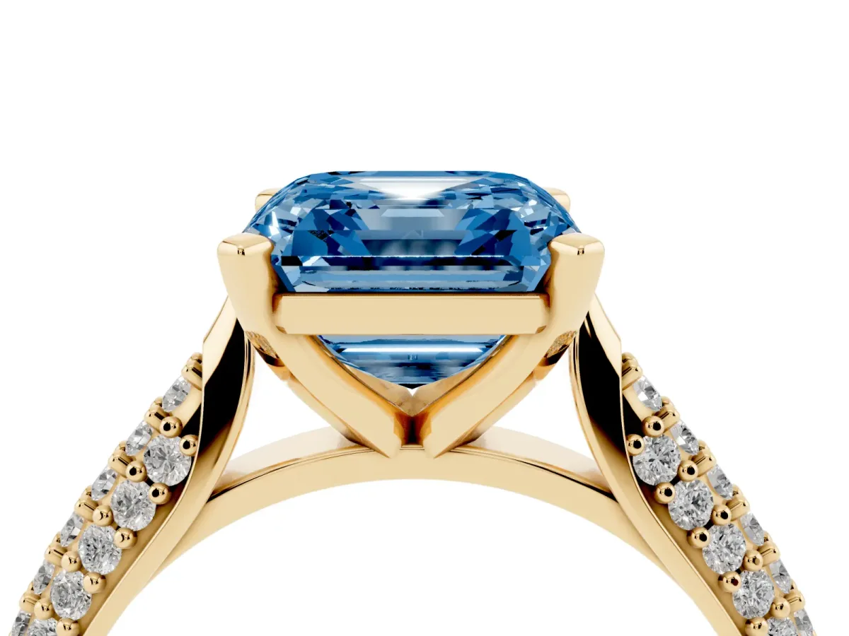 Fancy Blue Asscher Cut Diamond Solitaire Engagement Ring with Multi-Row Round Pavé Band and Prong Setting Yellow gold