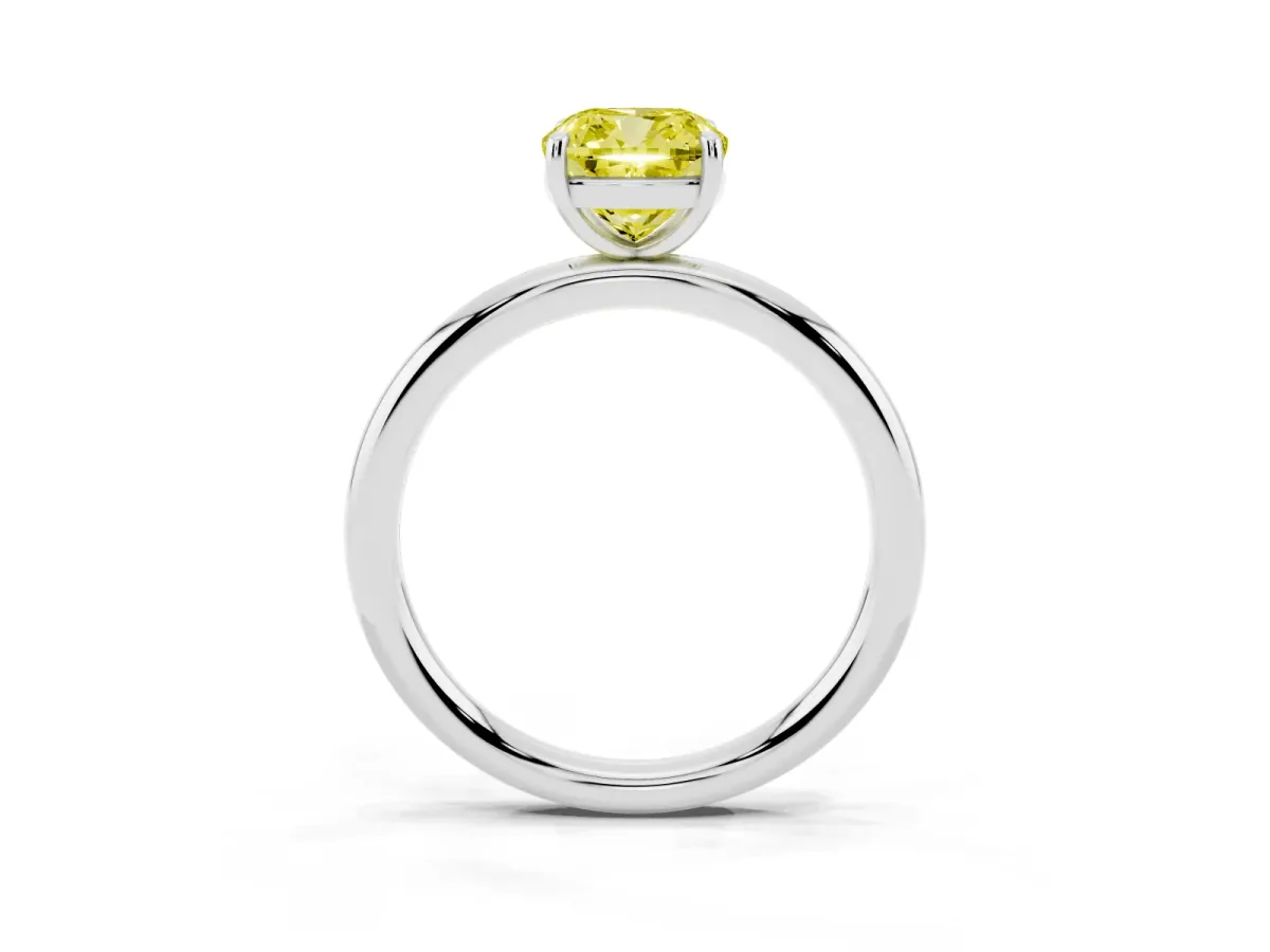 Fancy Yellow Cushion Cut Solitaire Diamond Ring with Four-Prong Setting on a Plain Band Silver