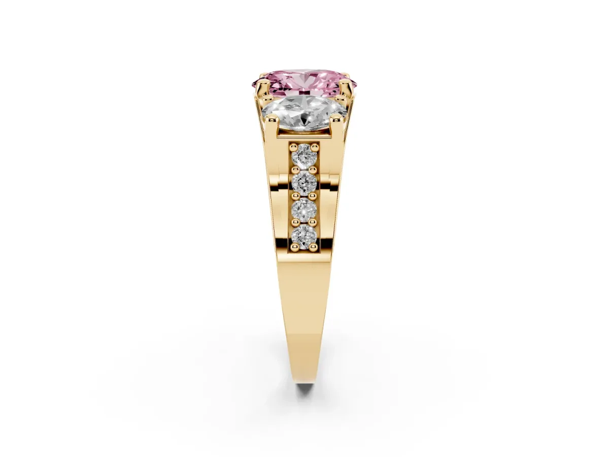 Fancy Pink Oval Cut Diamond Three-Stone Ring with Channel Set Band and Four-Prong Setting Yellow gold
