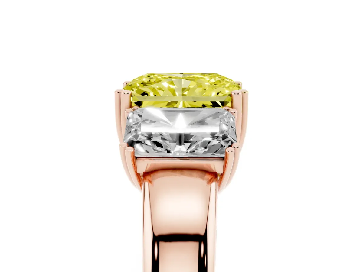 Fancy Yellow Three-Stone Radiant Cut Cut Diamond Ring with Channel Set Band and Four-Prong Setting Rose gold