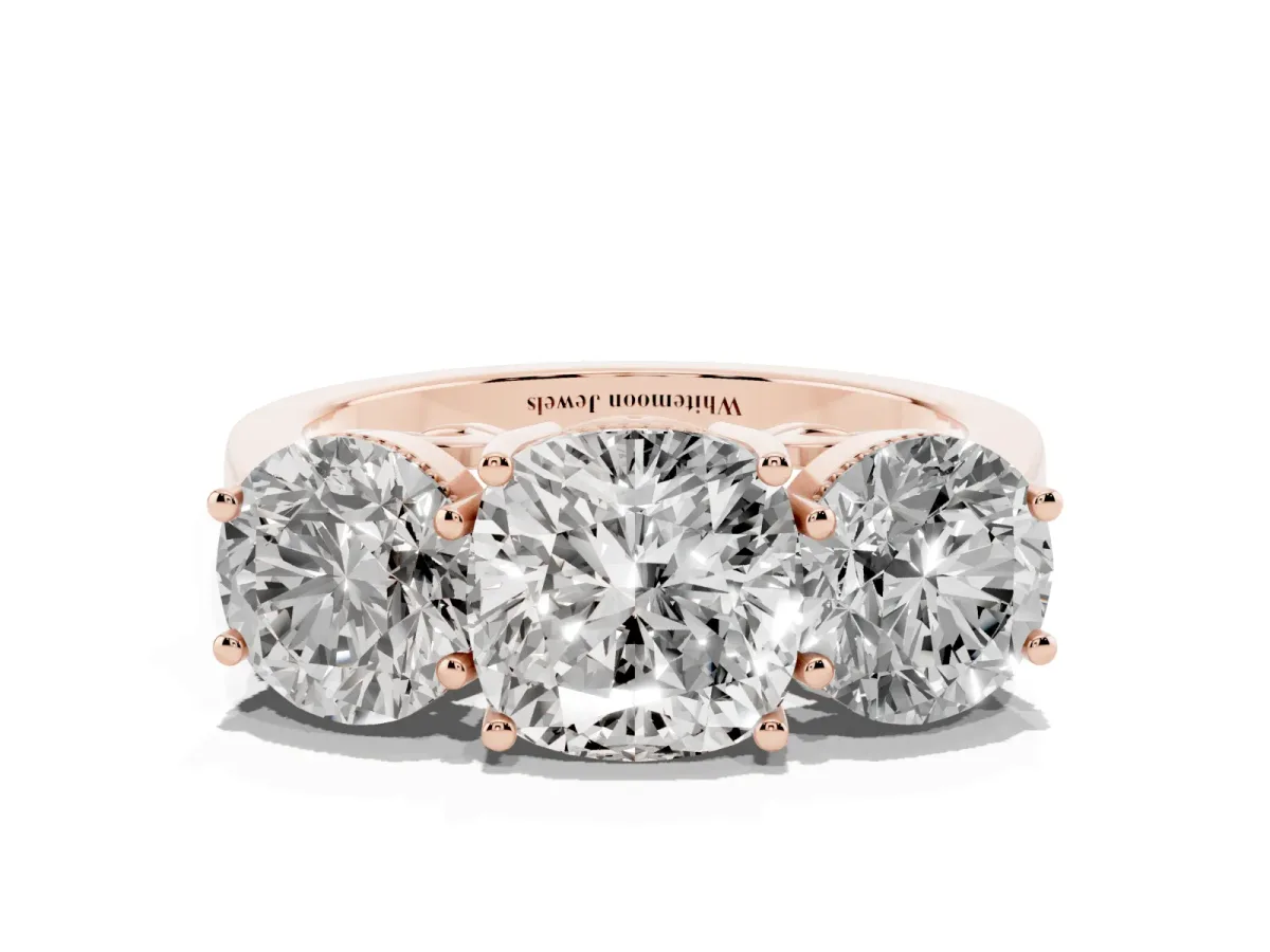 Three-Stone Cushion Cut Diamond Engagement Ring with Prong Setting on a Classic Band Rose gold