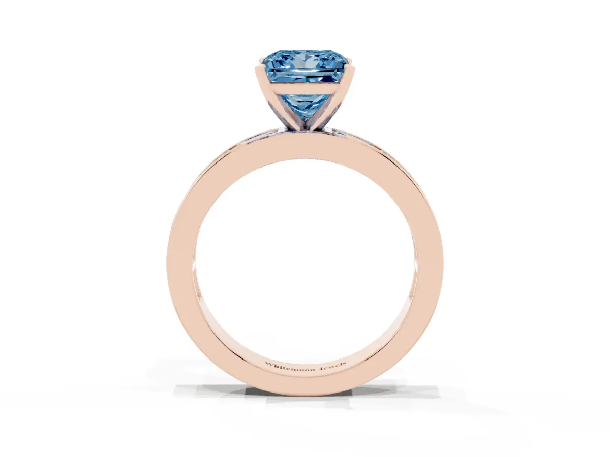 Fancy Blue Princess Cut Solitaire Diamond Ring with Channel-Set Baguette Band and Four-Prong Setting Rose gold