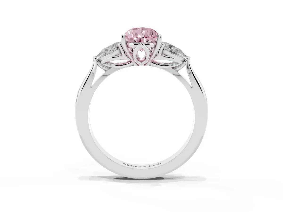 Fancy Pink Three-Stone Pear Cut Brilliant Diamond Solitaire Ring with Tapered Band and Four-Prong Setting White gold