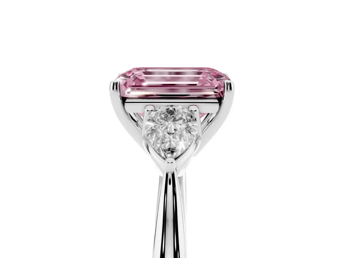 Fancy Pink Three-Stone Emerald Cut Brilliant Diamond Solitaire Ring with Tapered Band and Four-Prong Setting Silver