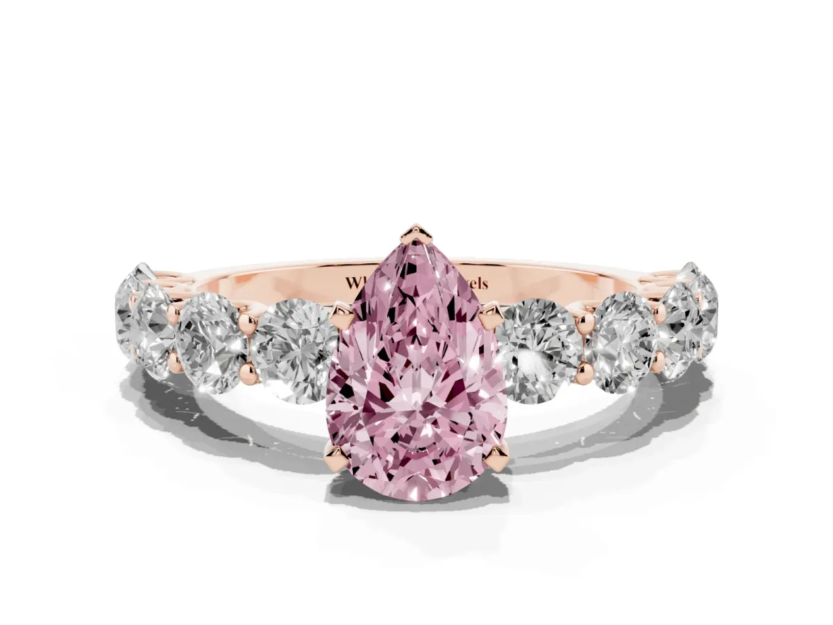 Fancy Pink Pear Cut Diamond Prong Setting with Side Stones on a Pave Band Rose gold