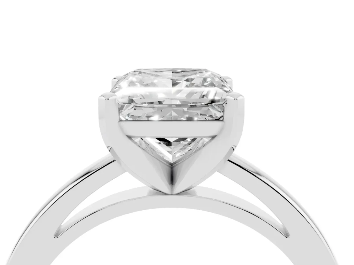 Princess Cut Solitaire Diamond Engagement Ring with Four-Prong Setting on a Classic Band Silver