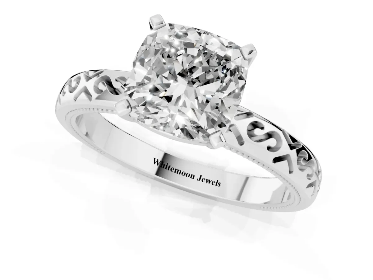 Cushion Cut Solitaire Engagement Ring with Scrollwork Band and Four-Prong Setting Platinum