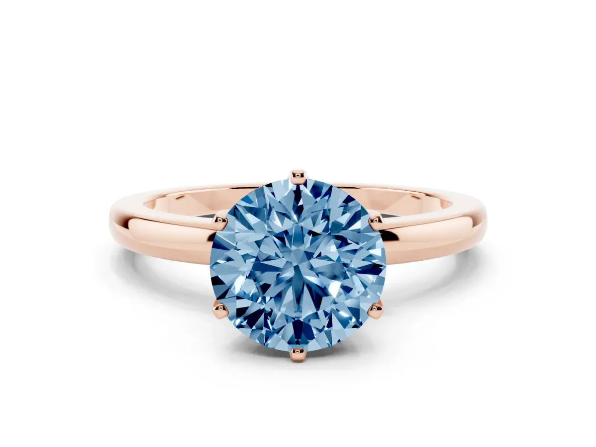 Fancy Blue Round Cut Solitaire Diamond Ring with Six-Prong Setting on a Classic Band Rose gold