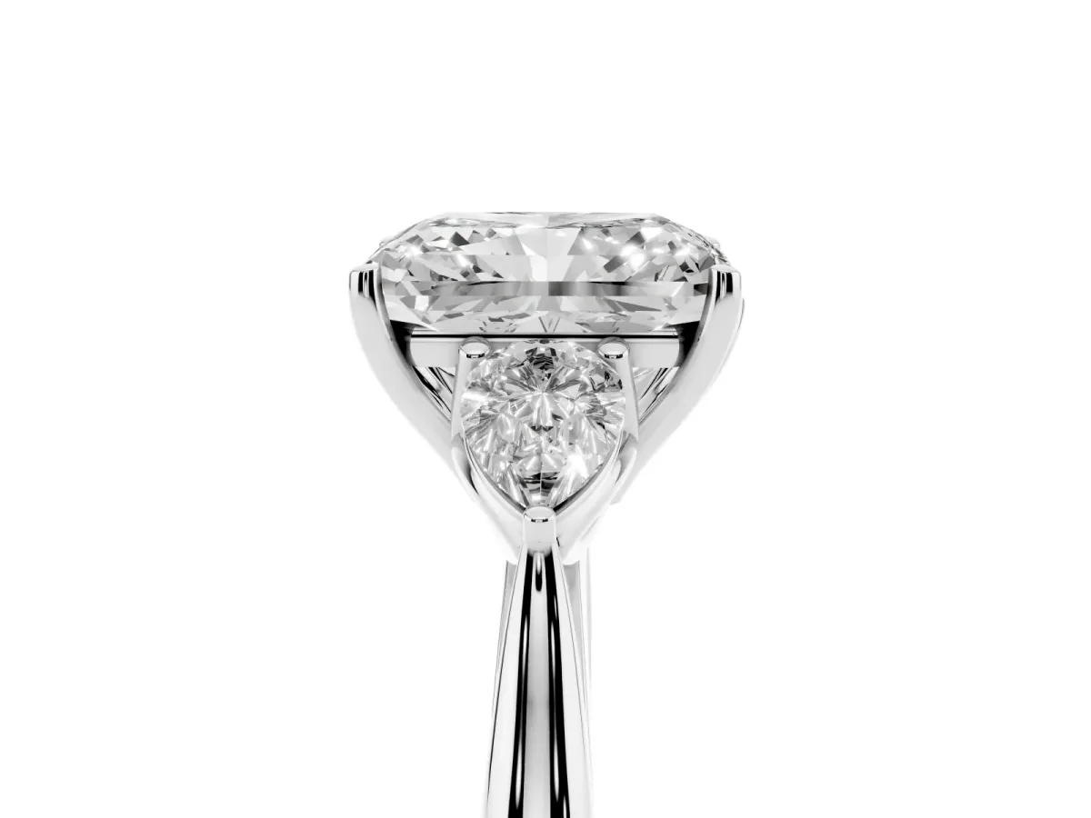 Three-Stone Radiant Cut Diamond Ring with Pear Side Stones in Four-Prong Setting Silver