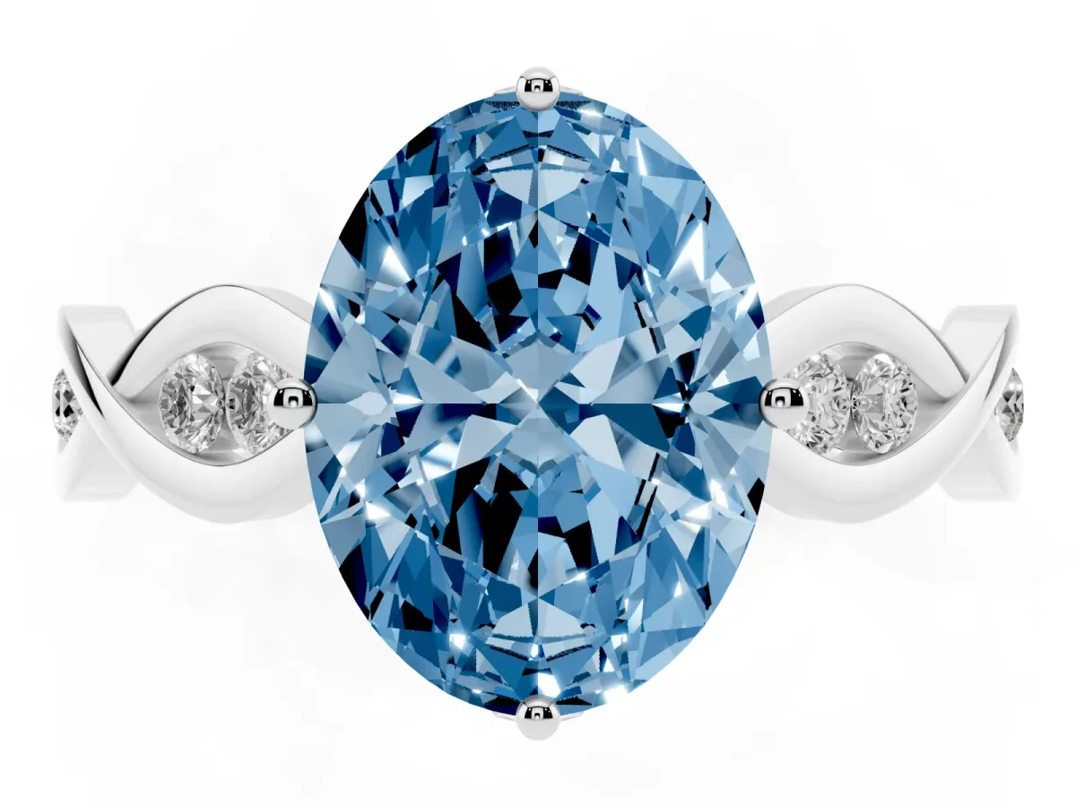 Fancy Blue Oval Cut Solitaire Twist Band with Leaf Prong Setting Silver