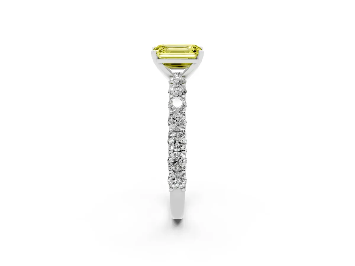 Fancy Yellow Emerald Cut Diamond Solitaire Ring with Shared Prong Pavé Band and Four-Prong Setting Silver
