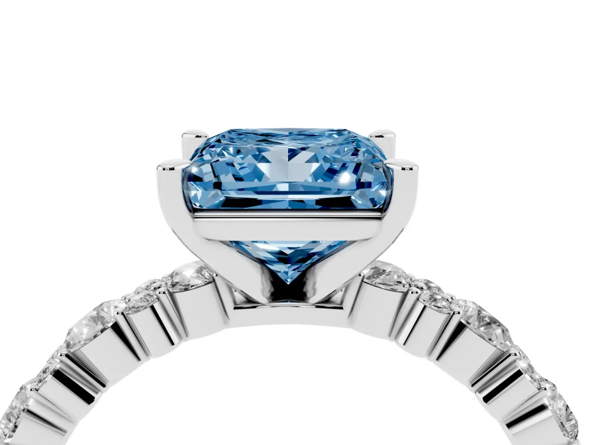 Fancy Blue Princess Cut Diamond Side Stone Solitaire Ring with Round and Four-Prong Setting Silver