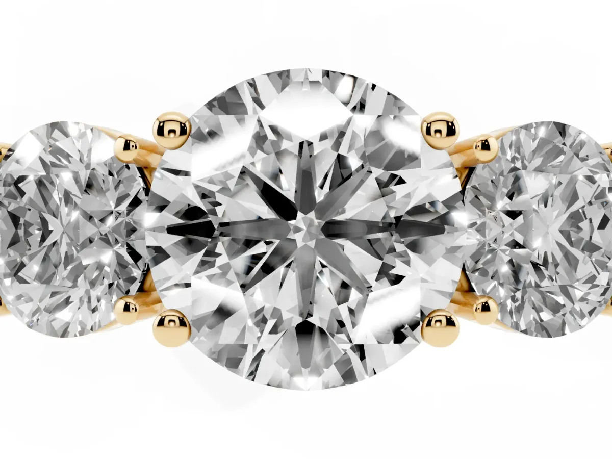 Three-Stone Round Cut Cut Diamond Engagement Ring with Flat Band and Four-Prong Setting Yellow gold