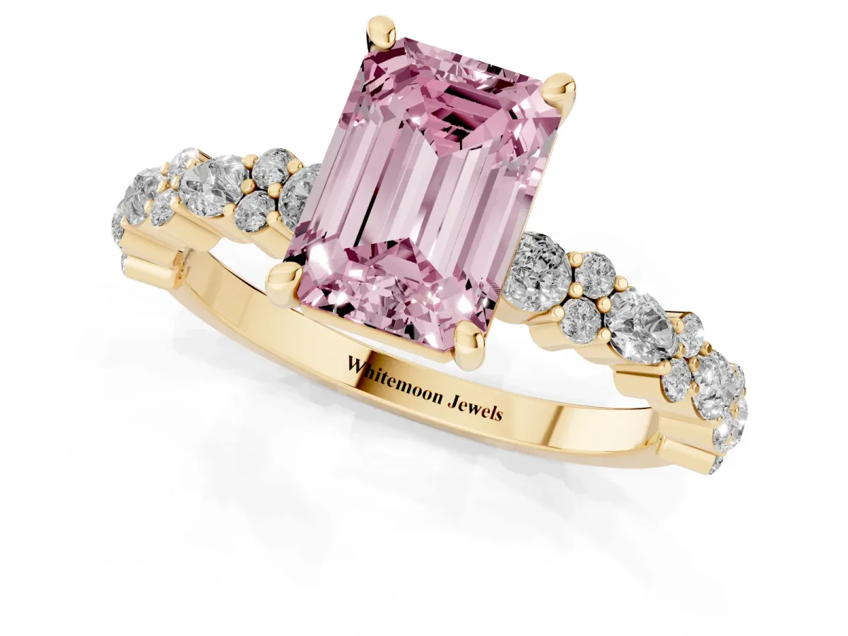 Fancy Pink Emerald Cut Diamond Side Stone Solitaire Ring with Round and Four-Prong Setting Yellow gold