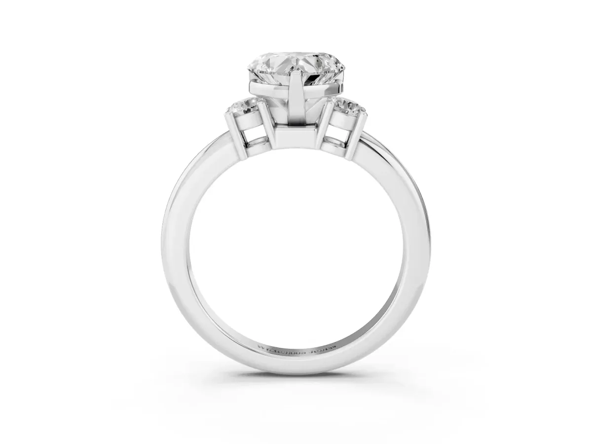 Three-Stone Heart Cut Cut Diamond Solitaire with Prong Setting and Classic Band Silver