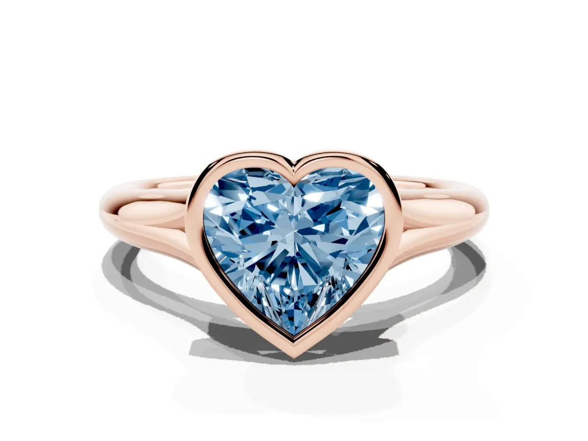 Fancy Blue Bezel Set Heart Cut Solitaire Diamond Ring with Smooth Band Rose gold