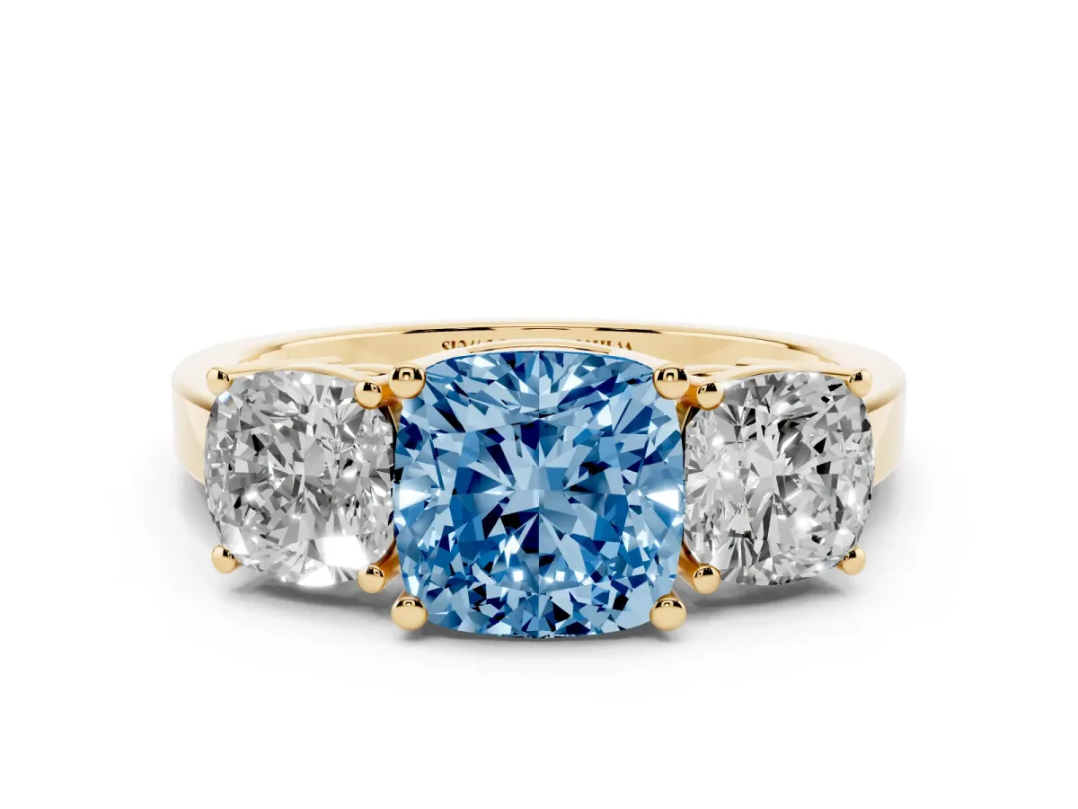 Fancy Blue Three-Stone Cushion Cut Cut Diamond Engagement Ring with Flat Band and Four-Prong Setting Yellow gold