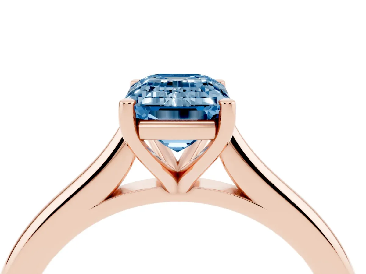 Fancy Blue Emerald Cut Cut Solitaire Ring with Cathedral Band and Four-Prong Setting Rose gold