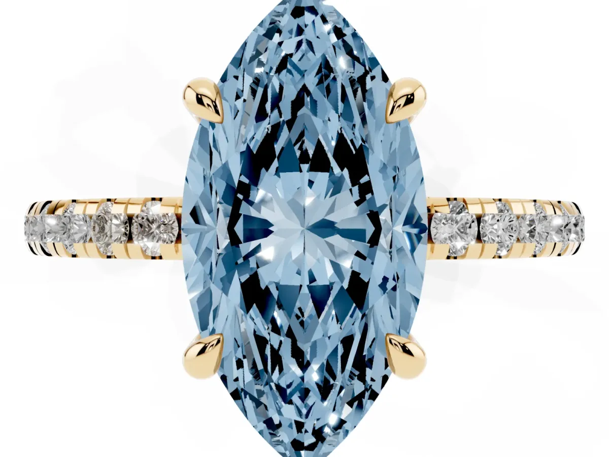 Fancy Blue Marquise Cut Diamond Brilliant Solitaire Ring with Pavé Band and Four-Prong Setting Yellow gold